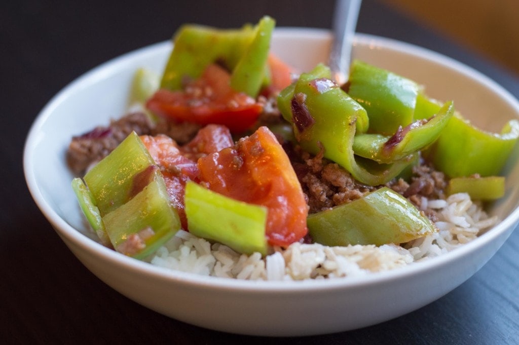 sweet and sour stir-fry skillet with tomatoes peppers and beef