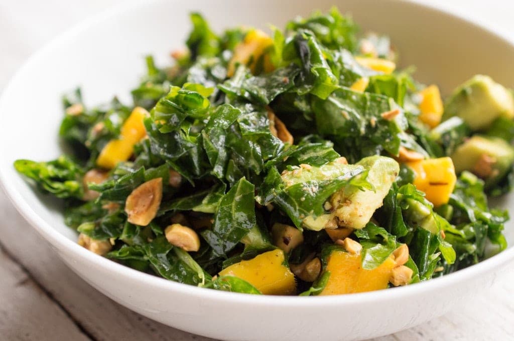 massaged-kale-salad-avocado-mango-hazelnut